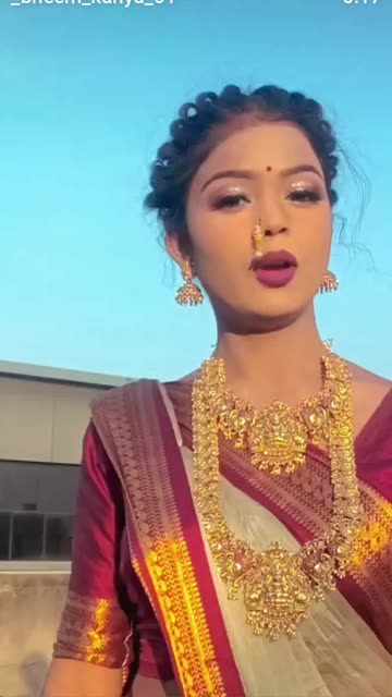 Maroon Dress With Gold Jewelry Videos