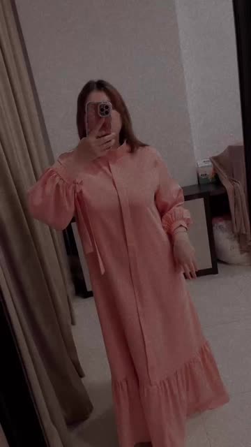 Lana  Shows Off Her Chic Pink Dress in Full-Length Mirror